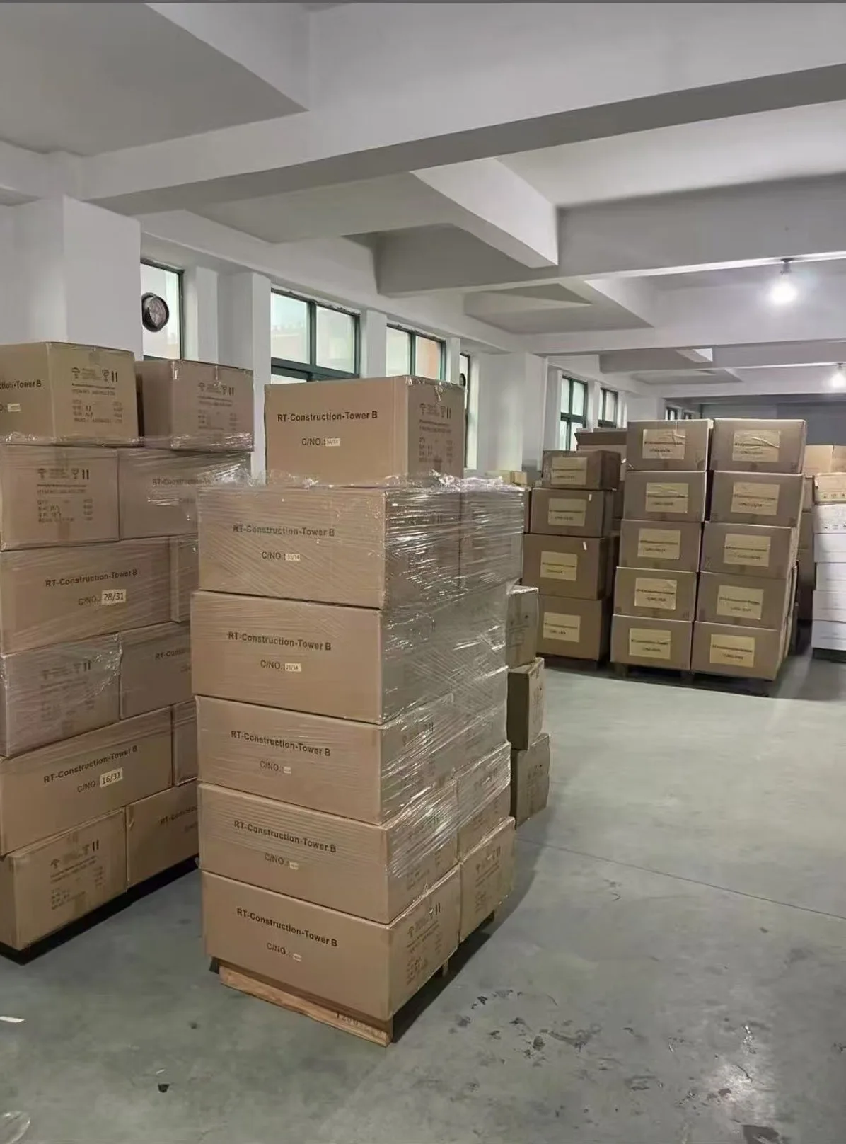 Warehouse with stacked boxes of lighting products